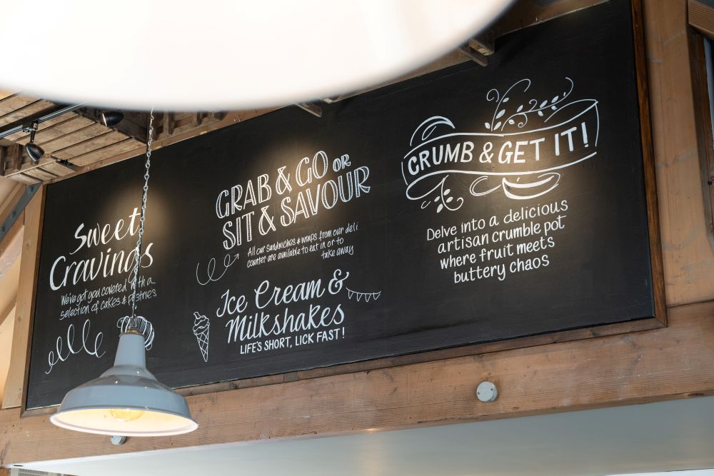 Chalkboard displaying savoury and sweet treats